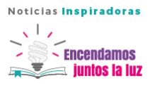 Libro abierto con un bombillo iluminando