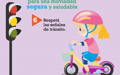 Señal de alto, niña en bicicleta haciendo señal de alto